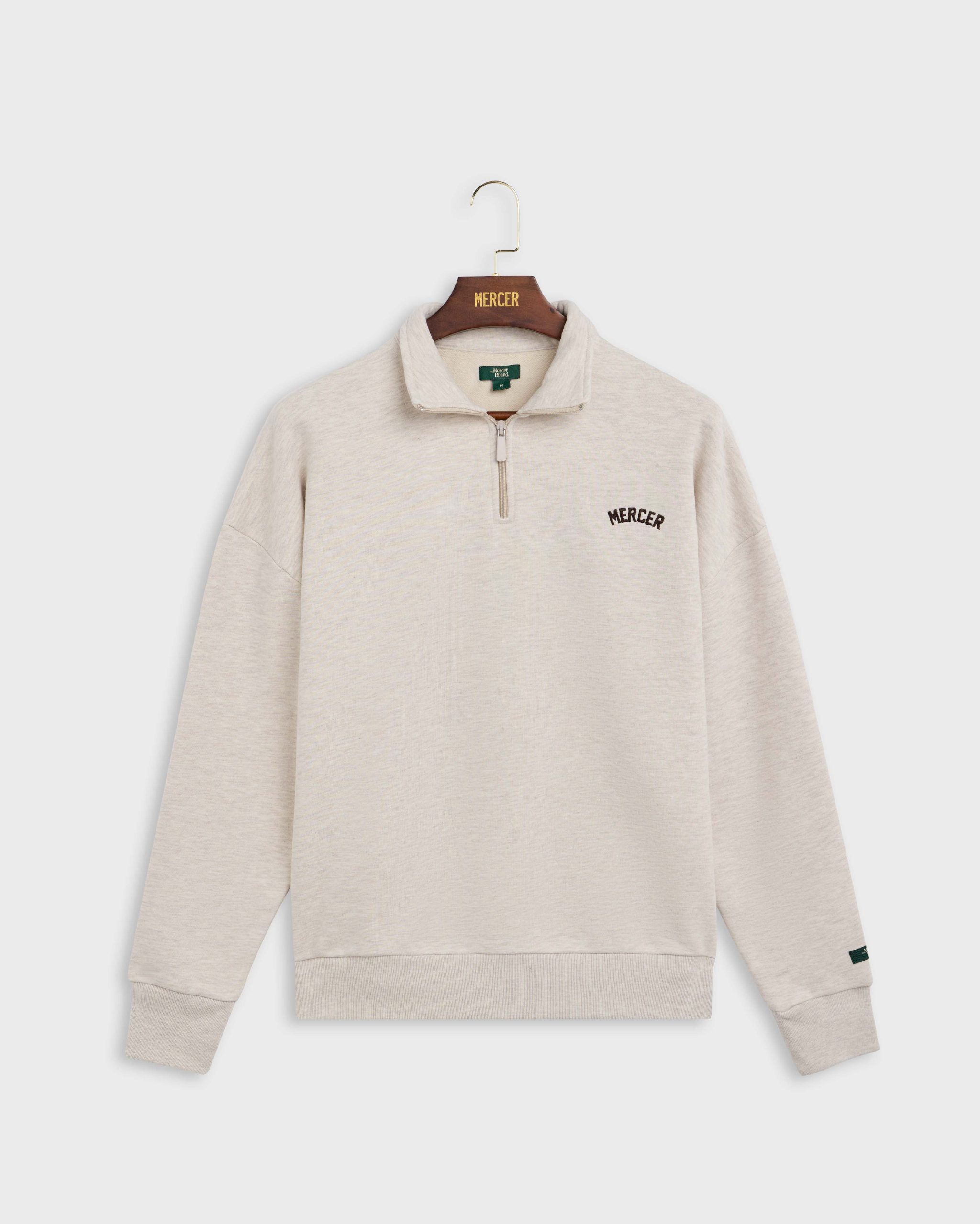 SUDADERA UNISEX OVERSIZE QUARTER ZIP BEIGE THE MERCER BRAND